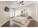 Inviting bedroom with a comfortable bed, stylish nightstands, modern decor, and access to a private balcony at 355 E Ohio St # 314, Indianapolis, IN 46204
