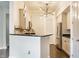 Modern kitchen featuring granite countertops, stainless steel appliances, and stylish pendant lighting at 355 E Ohio St # 314, Indianapolis, IN 46204