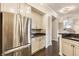 Bright kitchen features stainless steel appliances, white cabinets, and dark granite countertops at 355 E Ohio St # 314, Indianapolis, IN 46204