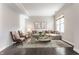 Cozy living room with a comfortable seating area, modern decor, and plenty of natural light from the windows at 355 E Ohio St # 314, Indianapolis, IN 46204