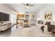 Bright and airy living room featuring a ceiling fan, hardwood floors, and an open floor plan at 355 E Ohio St # 314, Indianapolis, IN 46204