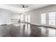 Upstairs living area with french doors, a ceiling fan, and hardwood floors at 355 E Ohio St # 314, Indianapolis, IN 46204