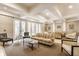 Elegant lounge with patterned sofa and stylish seating, showcasing sophisticated decor at 355 E Ohio St # 314, Indianapolis, IN 46204