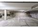 Well-lit parking garage with dedicated parking spaces and bicycle storage racks at 355 E Ohio St # 314, Indianapolis, IN 46204