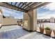 Private rooftop deck with a pergola and fireplace, offering city views and outdoor living space at 355 E Ohio St # 314, Indianapolis, IN 46204