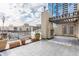 Rooftop deck featuring pergola and fireplace, with potted plants and open views at 355 E Ohio St # 314, Indianapolis, IN 46204