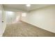 Finished basement with fresh paint, new carpet, and bright lighting, perfect for extra living space at 3640 Breen Dr, Indianapolis, IN 46235