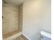 Beautiful bathroom features modern tiling and a walk-in shower at 3640 Breen Dr, Indianapolis, IN 46235
