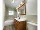 Nicely updated bathroom features a new vanity, updated faucet, and a tub and shower combo at 3640 Breen Dr, Indianapolis, IN 46235