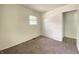Bedroom featuring neutral decor, carpet flooring, and a bright window for natural light at 3640 Breen Dr, Indianapolis, IN 46235
