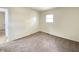 Bedroom featuring neutral decor, carpet flooring, a bright window for natural light and a closet at 3640 Breen Dr, Indianapolis, IN 46235