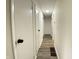 Hallway with wood flooring and neutral color palette at 3640 Breen Dr, Indianapolis, IN 46235