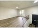 Bright living room featuring wood flooring and lots of natural light at 3640 Breen Dr, Indianapolis, IN 46235