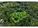 Overhead view showcases a large, private property with a pool and lush surroundings, perfect for seclusion at 4128 Whitetail Woods Dr, Bargersville, IN 46106