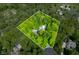 Overhead view showcases a large, private property with a pool and lush surroundings, perfect for seclusion at 4128 Whitetail Woods Dr, Bargersville, IN 46106