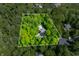 Aerial view of a wooded property featuring an in-ground pool at 4128 Whitetail Woods Dr, Bargersville, IN 46106