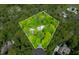 Overhead view showcases a large, private property with a pool and lush surroundings, perfect for seclusion at 4128 Whitetail Woods Dr, Bargersville, IN 46106