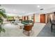 A spacious finished basement area with carpet, furniture, and bar seating at 4128 Whitetail Woods Dr, Bargersville, IN 46106