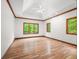 Bright and airy bedroom with large windows, hardwood floors, and tray ceilings at 4128 Whitetail Woods Dr, Bargersville, IN 46106