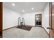 Empty room with a gym, a mirrored bathroom can be seen through the door at 4128 Whitetail Woods Dr, Bargersville, IN 46106
