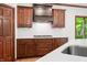 Beautiful kitchen featuring a gas range, custom cabinets, and bright countertops at 4128 Whitetail Woods Dr, Bargersville, IN 46106