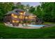 In-ground pool with a patio and furniture at 4128 Whitetail Woods Dr, Bargersville, IN 46106