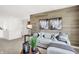 Comfortable living room with wood accent wall, light gray sofa, decorative pillows, and stylish decor at 4405 Mendocino Blvd, Indianapolis, IN 46239
