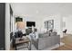 Contemporary living room featuring modern furniture, decor, and neutral color palette at 4405 Mendocino Blvd, Indianapolis, IN 46239