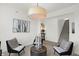 Inviting living room featuring comfortable seating, neutral color palette, and a view of the staircase at 4405 Mendocino Blvd, Indianapolis, IN 46239