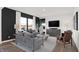 Cozy living room boasts modern furnishings and ample natural light, creating a relaxing atmosphere at 4405 Mendocino Blvd, Indianapolis, IN 46239