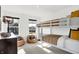 Stylish bedroom with bunk beds, bean bag chairs, and view to the outdoors at 4411 Mendocino Blvd, Indianapolis, IN 46239