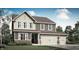Charming two-story home with a three-car garage, brick accents, and landscaped yard at 4411 Mendocino Blvd, Indianapolis, IN 46239
