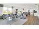 Bright, open-concept living room featuring a comfortable sofa, modern decor, and a smooth transition to the kitchen at 4411 Mendocino Blvd, Indianapolis, IN 46239