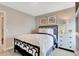 Comfortable bedroom with contemporary furnishings, soft carpet and a bright, airy feel at 4518 Laughter Ln, Indianapolis, IN 46235
