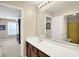 This bathroom has a long countertop and attached mirror at 4602 Amesbury Pl, Westfield, IN 46062