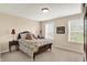 This bedroom has carpet floors, a window, and natural light at 4602 Amesbury Pl, Westfield, IN 46062