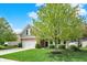 Charming home with a manicured lawn and mature landscaping at 4602 Amesbury Pl, Westfield, IN 46062