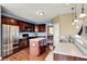 A well-appointed kitchen showcases modern appliances, cabinetry, and an island that invites gatherings and culinary exploration at 4602 Amesbury Pl, Westfield, IN 46062