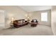 Inviting living room featuring neutral carpet, vaulted ceilings and comfortable seating at 4602 Amesbury Pl, Westfield, IN 46062