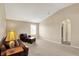 Bright living room featuring neutral carpet, vaulted ceilings and comfortable seating at 4602 Amesbury Pl, Westfield, IN 46062