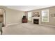 Inviting living room with cozy fireplace and ample space for entertaining guests at 4602 Amesbury Pl, Westfield, IN 46062