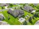 Expansive backyard featuring a patio, hot tub, and lush landscaping perfect for outdoor entertaining and relaxation at 4890 Benthaven E Dr, Bargersville, IN 46106