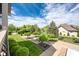 Lush backyard featuring manicured landscaping, mature trees, and a well-maintained lawn with views of surrounding homes at 4890 Benthaven E Dr, Bargersville, IN 46106