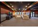Spacious basement featuring a sectional, entertainment center, and natural light from multiple windows at 4890 Benthaven E Dr, Bargersville, IN 46106