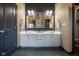 Elegant bathroom with double vanity, vessel sinks, and stylish modern fixtures at 4890 Benthaven E Dr, Bargersville, IN 46106