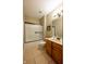 Bathroom with tile flooring, shower and tub combo, and wood vanity with sink at 4890 Benthaven E Dr, Bargersville, IN 46106