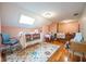 Bedroom featuring a sewing station, wood floors, and abundant natural light at 4890 Benthaven E Dr, Bargersville, IN 46106