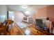 Unique bedroom with hard wood flooring, skylight, and custom sewing machines at 4890 Benthaven E Dr, Bargersville, IN 46106
