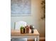 Desk featuring books, a potted plant, a globe, and a vintage-style world map on the wall at 4890 Benthaven E Dr, Bargersville, IN 46106