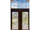 Stained glass front door featuring intricate decorative patterns, metal caming and dual hardware at 4890 Benthaven E Dr, Bargersville, IN 46106
